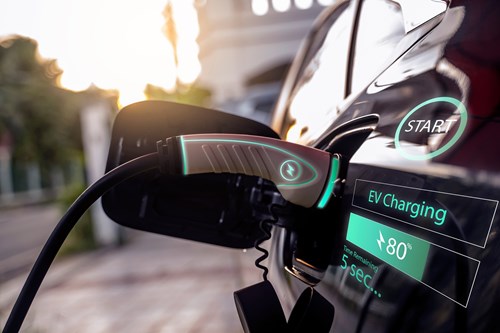 AI in EV Charging image of EV charging with digital screen