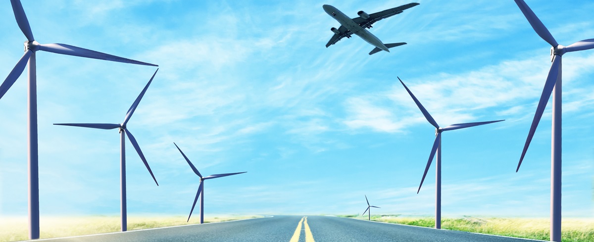 plane and wind turbines