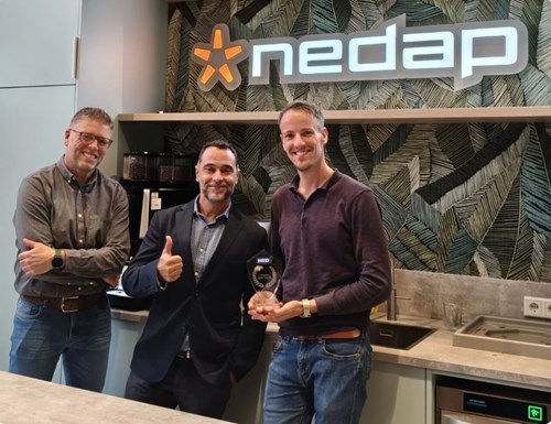 Nedap and HID Celebrate Seamless Integration for High-Security Vehicle Access Control Nedap team receiving a trophy