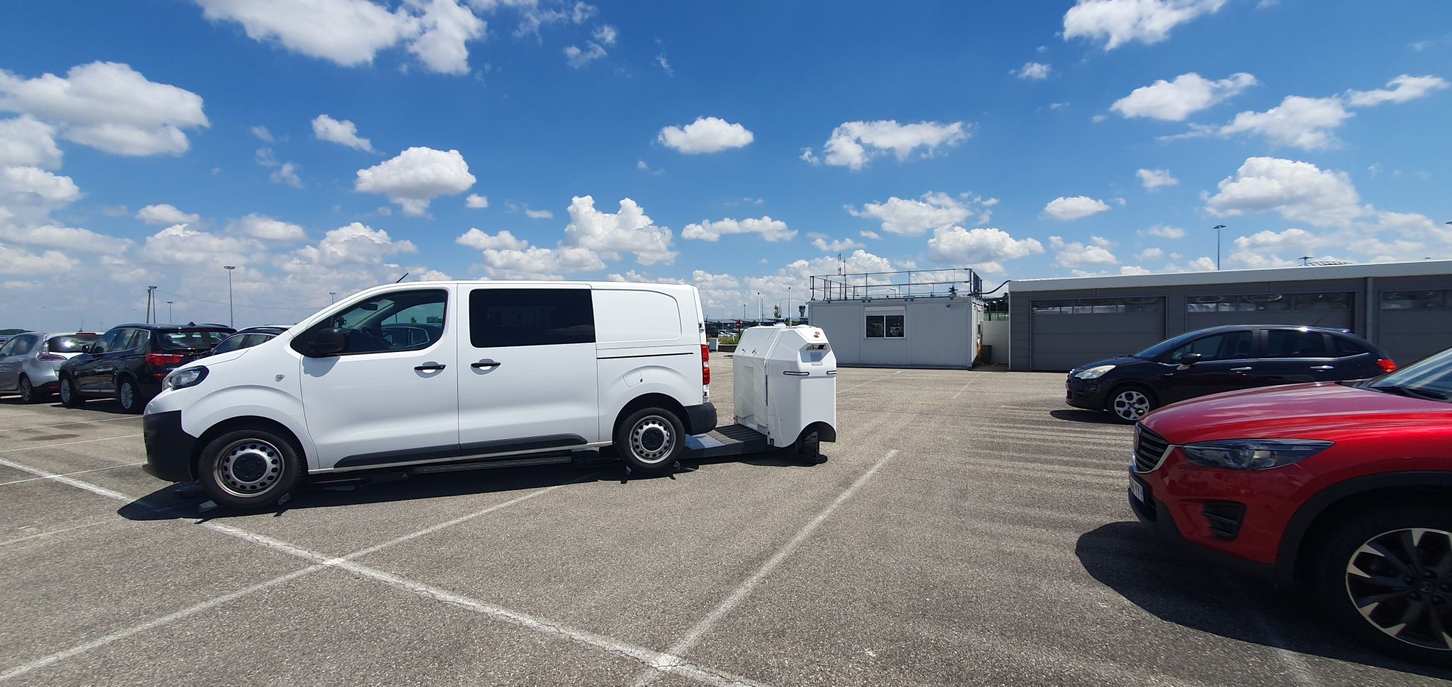 a car being transported with Stan robot